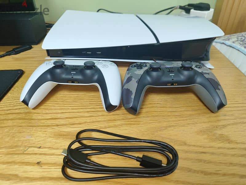 PS5 slim digital with 2 controllers 4