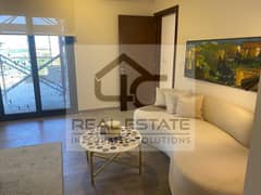 With a down payment, an apartment in a prime location, fully finished with air conditioners, for sale in Zed East 0