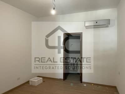 Apartment finished with air conditioners for sale in installments, first floor, in Zed East, Fifth Settlement