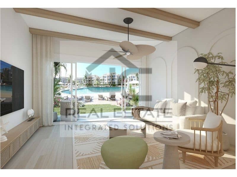 Townhouse for sale, steps from the sea, with the lowest price, prime location, roof open to the largest lagoon, landscape area 1