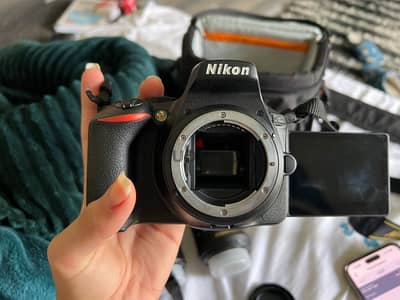 Nikon D5600, with lens, charge, bag, strap