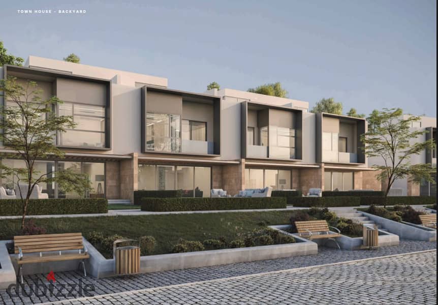 Live in a resale villa directly from the owner in installments in KARMA GATES in Sheikh Zayed Direct on Dahshur Link Road 4