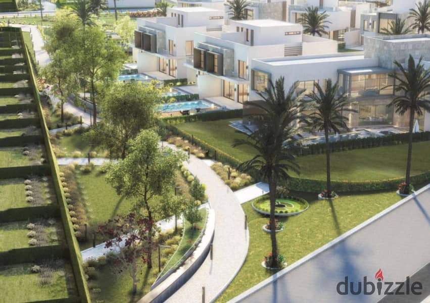 Live in a resale villa directly from the owner in installments in KARMA GATES in Sheikh Zayed Direct on Dahshur Link Road 9