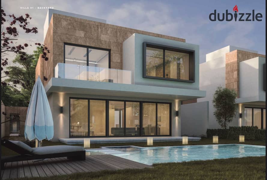 Live in a resale villa directly from the owner in installments in KARMA GATES in Sheikh Zayed Direct on Dahshur Link Road 11