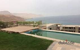 Chalet for sale in Monte Galala, Ain Sokhna, 126 sqm, 3 rooms, first floor, first row on the lagoon, fully finished, immediate receipt with furniture 2