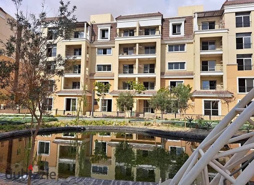 In front of Madinaty 3-bedrooms apartment for sale in installments in Sarai New Cairo 2