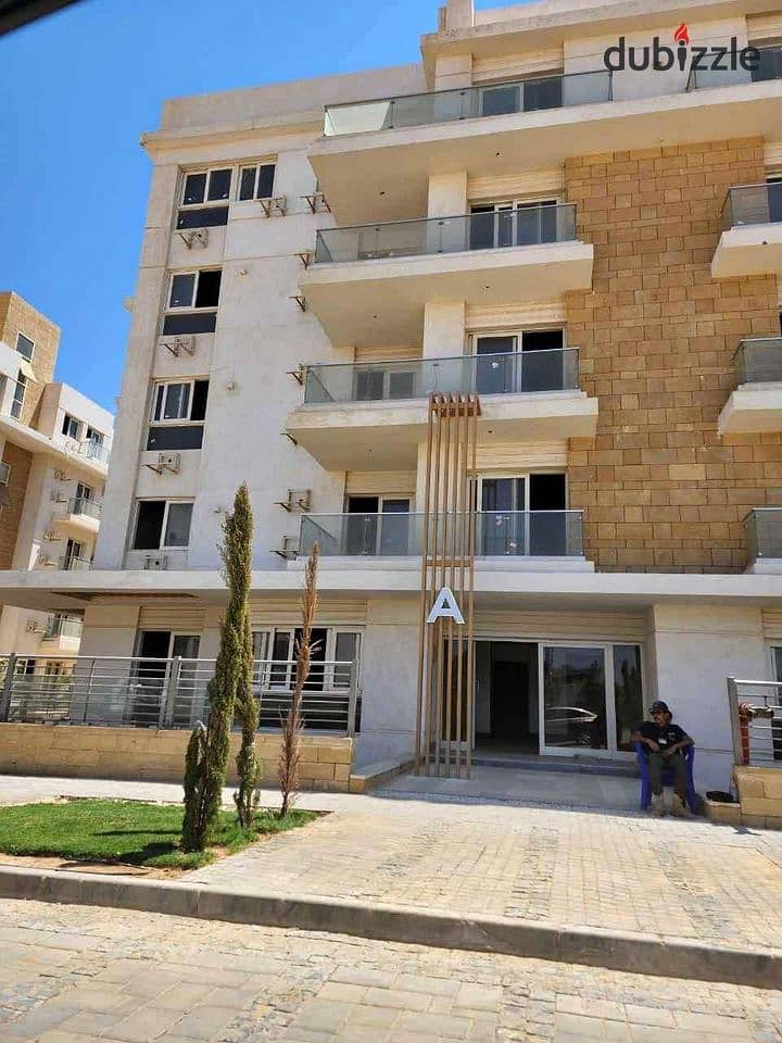 Apartment for sale in a private garden near Sheikh Zayed  in mountain view  minutes from Mall of Arabia and the northern expansions 6