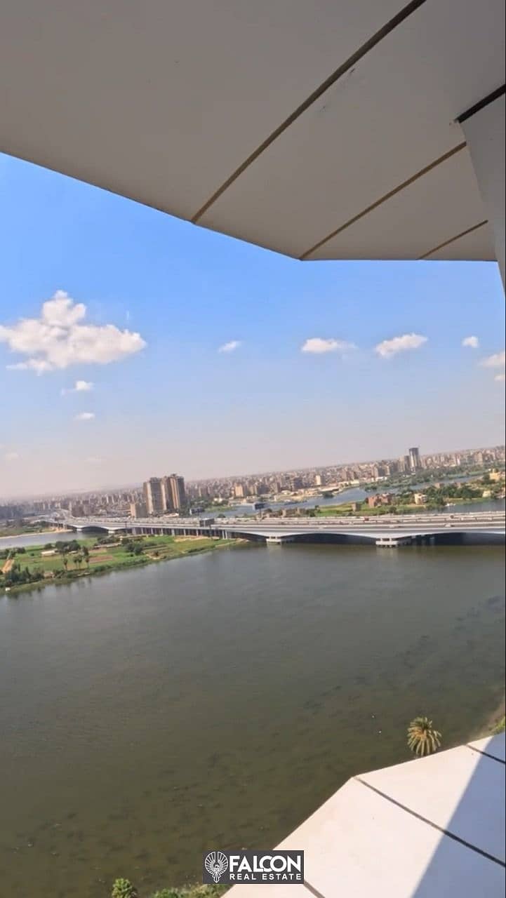 Hotel apartment directly on the Nile, immediate delivery, fully finished and with Hilton Maadi hotel services in the Nile Pearl Towers 9