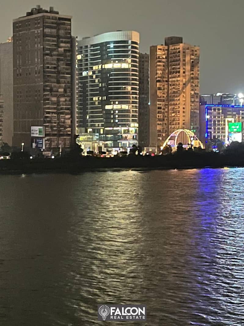 Hotel apartment directly on the Nile, immediate delivery, fully finished and with Hilton Maadi hotel services in the Nile Pearl Towers 14