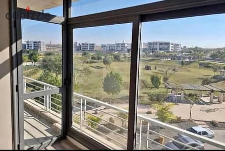 Apartment in the last phase of Taj City, directly in front of the airport and on the Suez Road, minutes from the Fifth Settlement