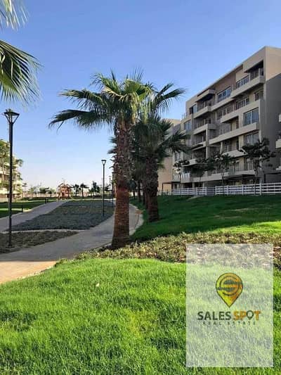 With a cash discount of 42%, a 136 sqm apartment + a 128 sqm private garden for sale in the Taj City Compound in the New Cairo