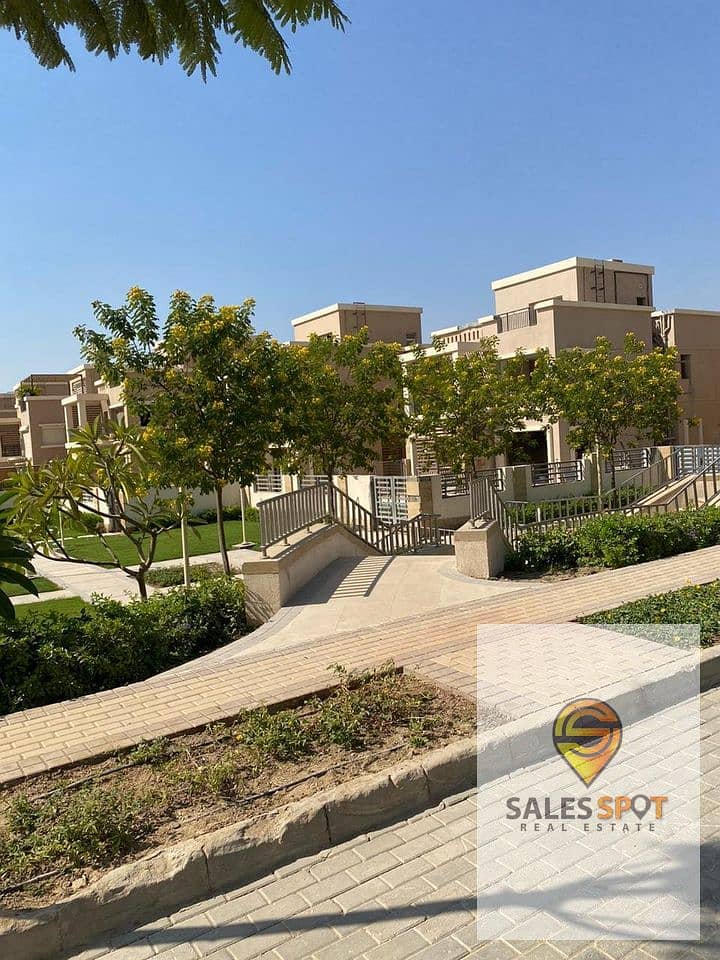 With a cash discount of 42%, a 136 sqm apartment + a 128 sqm private garden for sale in the Taj City Compound in the New Cairo 4