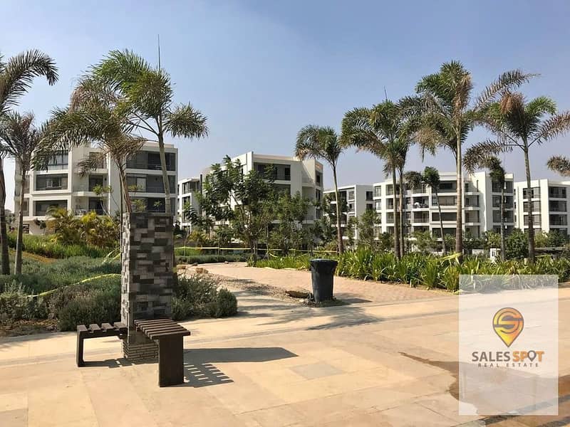 With a cash discount of 42%, a 136 sqm apartment + a 128 sqm private garden for sale in the Taj City Compound in the New Cairo 5