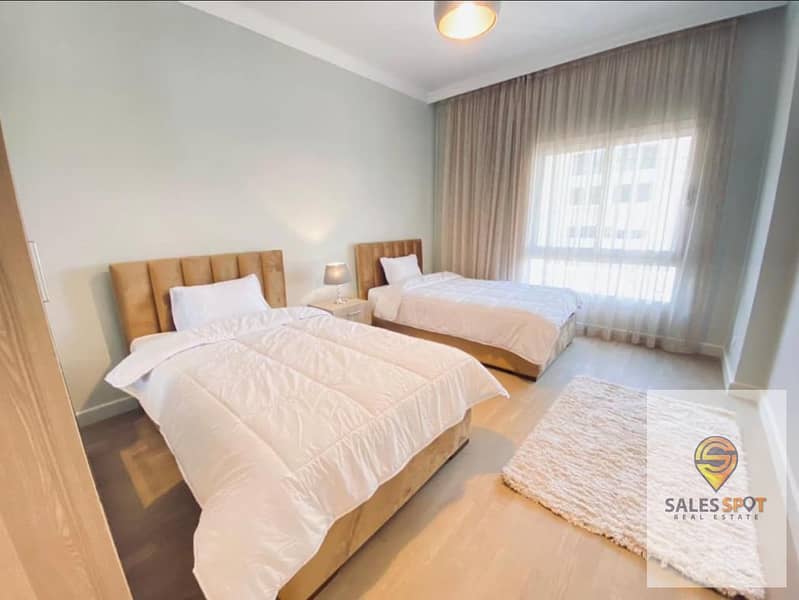 With convenient installments, own a distinctive apartment for sale, 3/4 finished, in Trio Gardens Compound in the Fifth Settlement in Golden Square, w 4