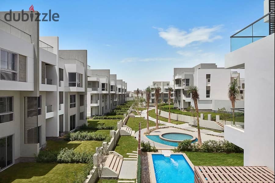 Townhouse in the best location in New Cairo, area of ​​324 square meters, with garden and open roof, 30% down payment, payment period of up to 5 years 7