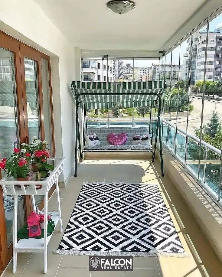 Apartment for sale in the most distinguished stage in Taj City Compound in a very special location in front of Cairo Airport with an open view 5