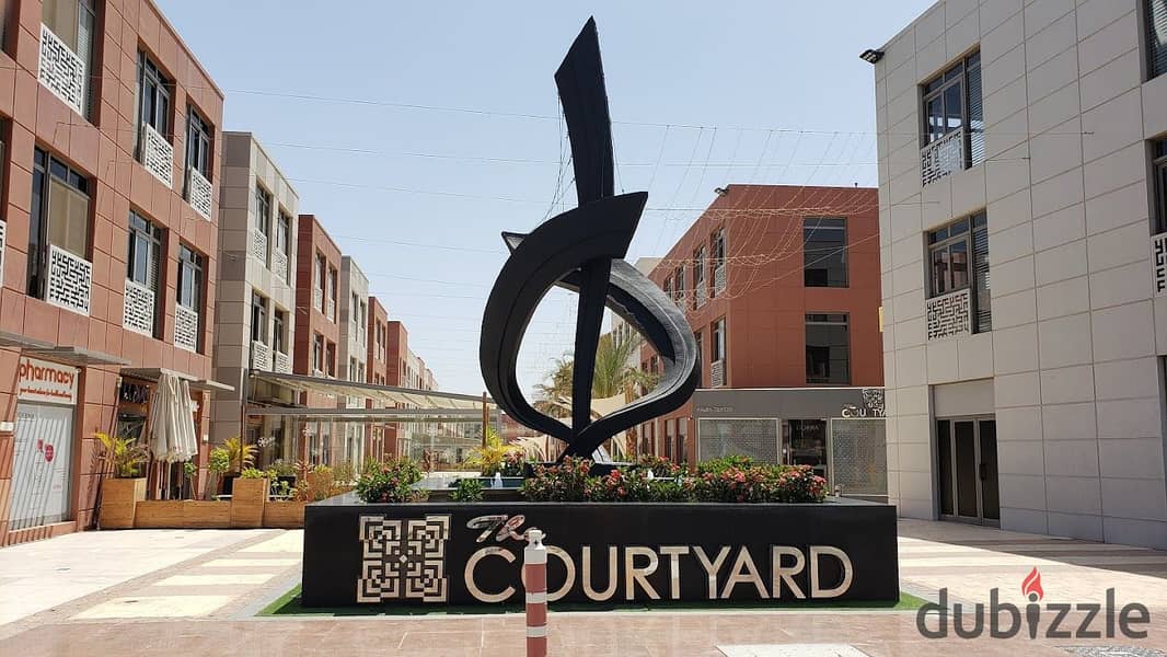 Office for rent, administrative headquarters, 515 square meters, fully finished, furnished, and air conditioners, The Courtyard, Sheikh Zayed, near th 18