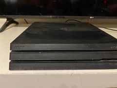 Ps4 pro with 1 controller & games 0