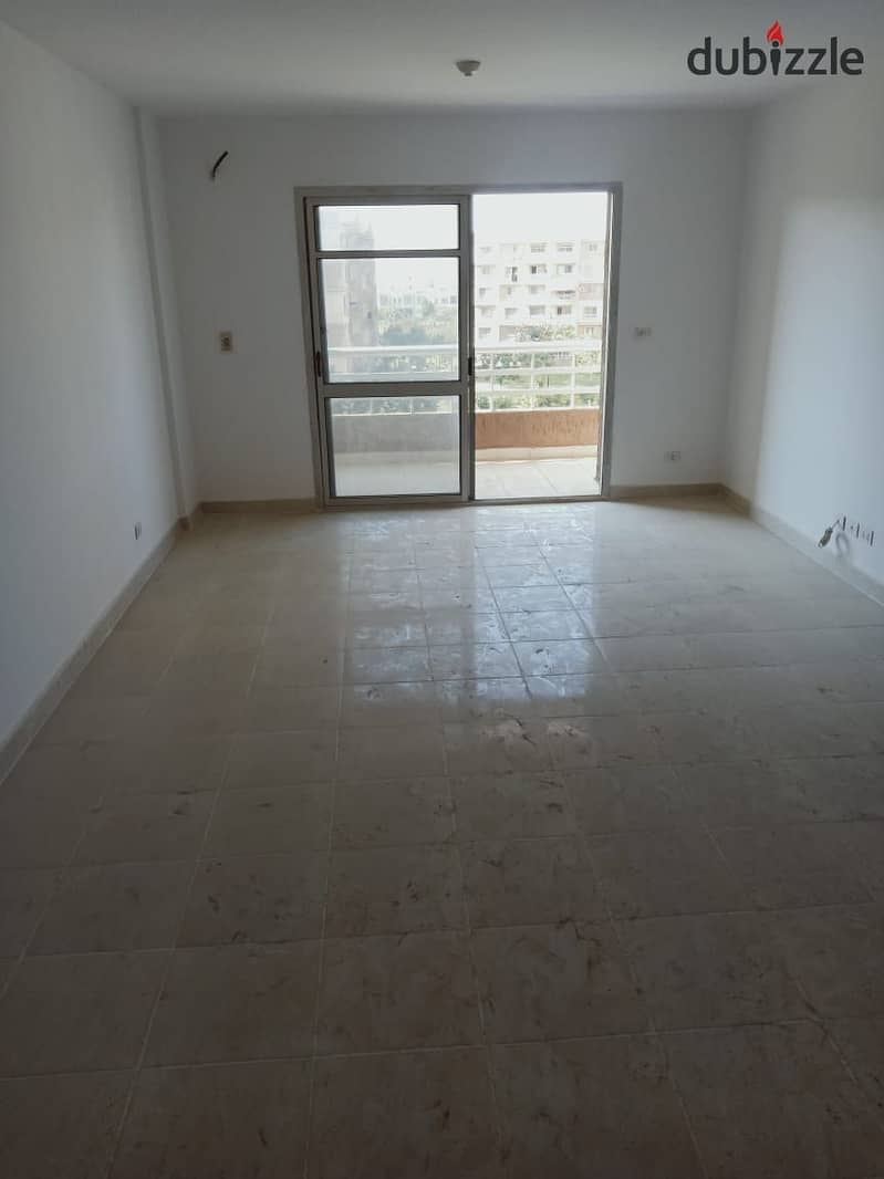 In Madinaty, an apartment for rent, empty law, area of ​​​​132 square meters, a view of the garden and a street in front of Al-Far Market and the mosq 2