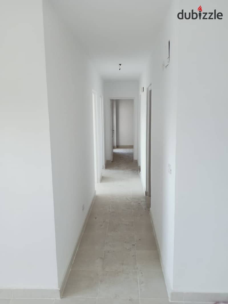 In Madinaty, an apartment for rent, empty law, area of ​​​​132 square meters, a view of the garden and a street in front of Al-Far Market and the mosq 7