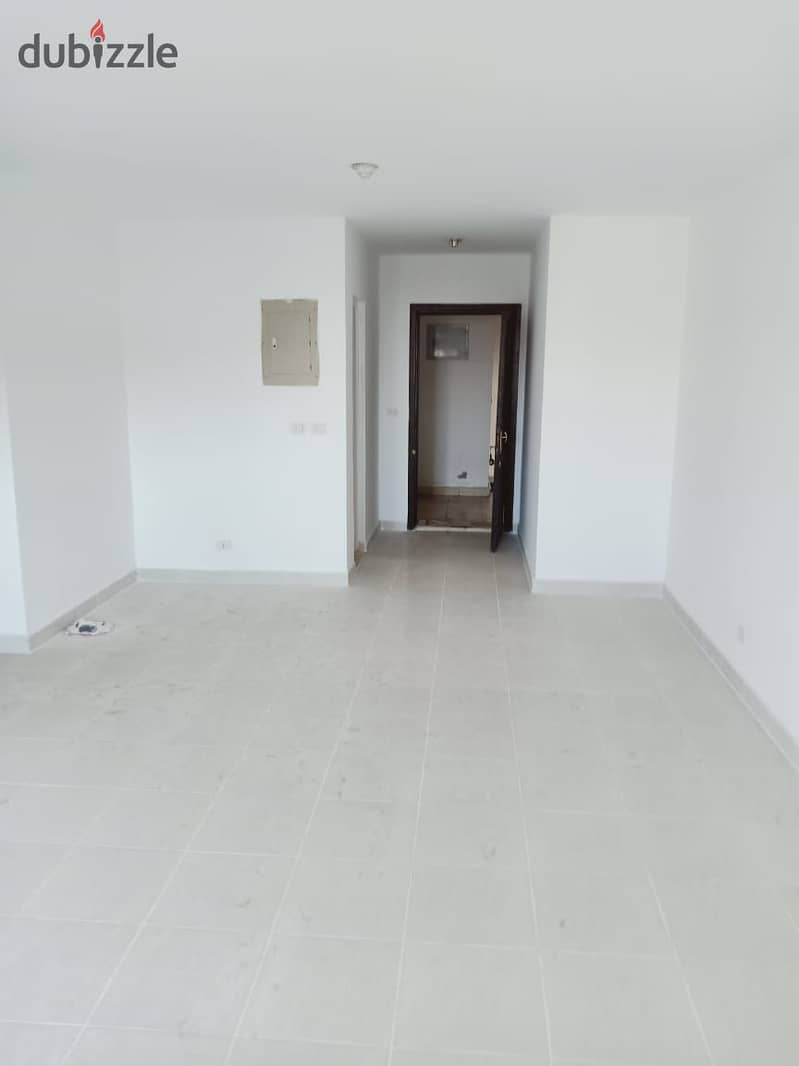 In Madinaty, an apartment for rent, empty law, area of ​​​​132 square meters, a view of the garden and a street in front of Al-Far Market and the mosq 8