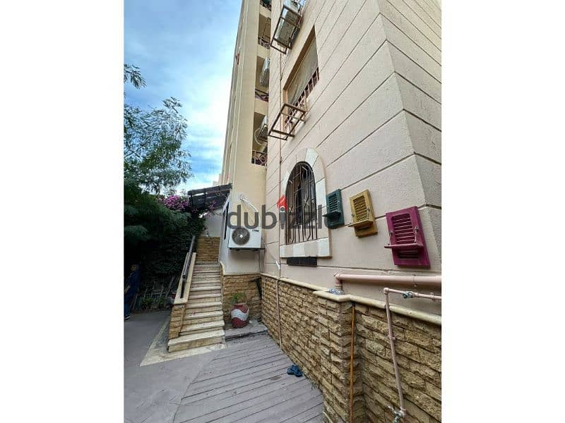 Studio for sale with private garden, fully furnished and equipped, in Al Rehab, with an investment opportunity by renting it out. 8