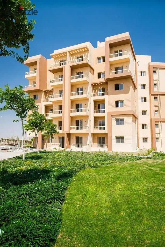 Apartment for sale in Ashgar City in installments without interest, overlooking green spaces and water bodies. . | October - Ashgar Heights - Badia - Ha 11