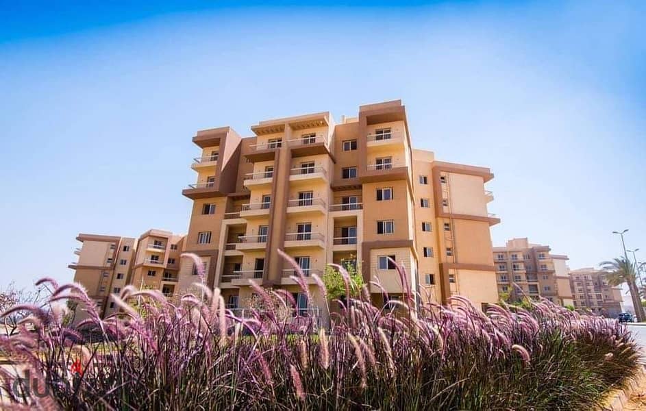 Apartment for sale in Ashgar City in installments without interest, overlooking green spaces and water bodies. . | October - Ashgar Heights - Badia - Ha 26