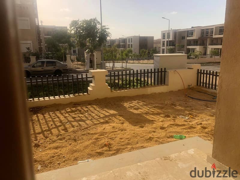 3-storey villa for sale in installments in a compound in front of Madinaty, distinctive division + large garden 1