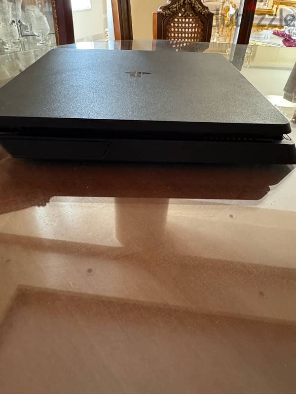 PS 4 Slim - 1 TB 3