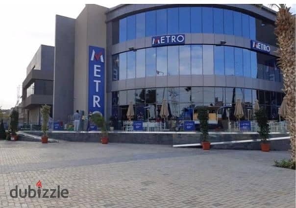 Shop For Rent In Palm Hills, directly on the axis of The Ellen Mall  In front of Arkan Plaza 1