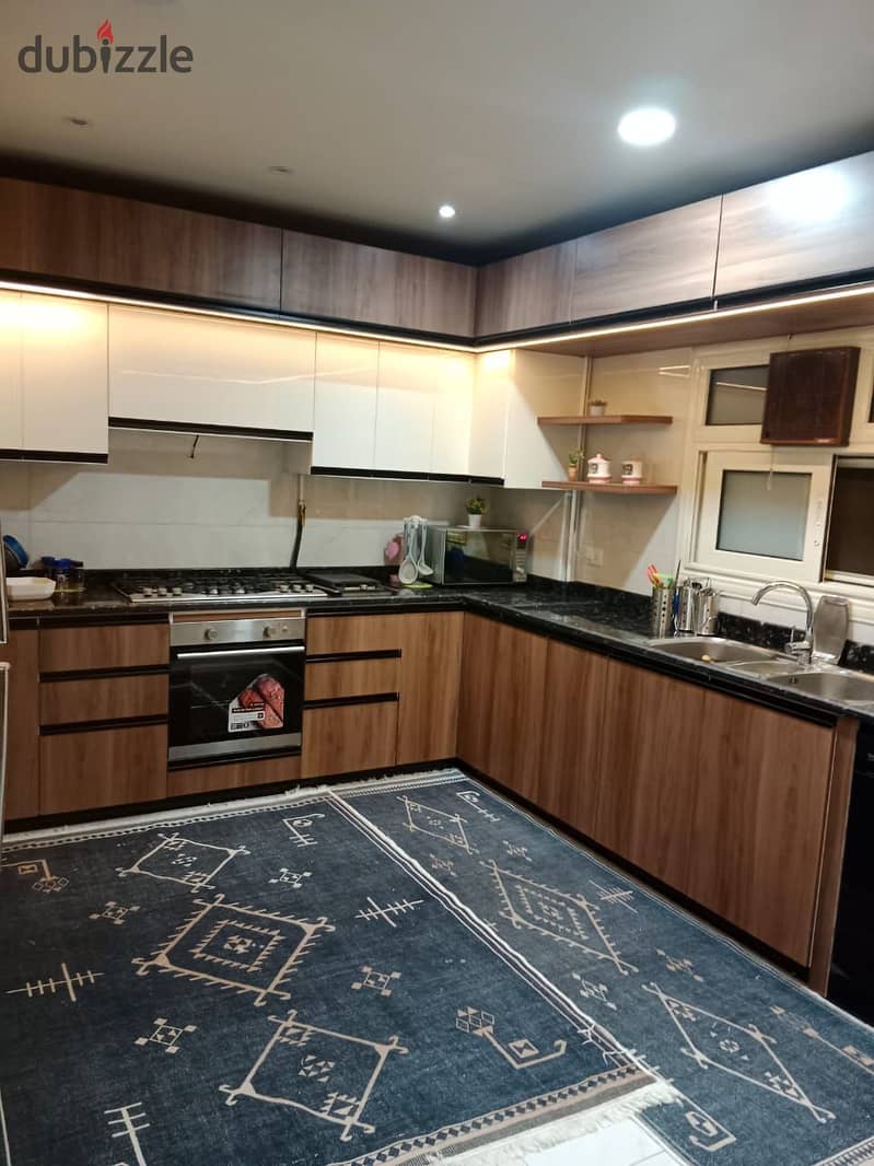 Apartment for sale with kitchen and air conditioners, Al-Tagamoa, First District  Near Al-Baghdadi Square, South Ninety, Malls and Services Area 15