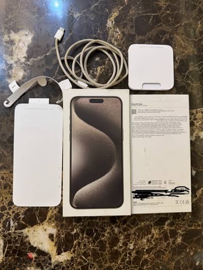 iPhone 15 pro max natural titanium الحالة ممتازة زي الجديد بطارية ٩١