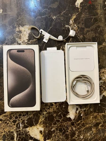 iPhone 15 pro max natural titanium الحالة ممتازة زي الجديد بطارية ٩١ 6