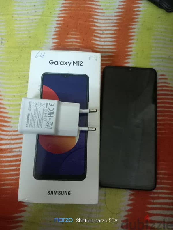 samsung M12 كسر زيرو علبه وشاحن معملش اي صيانه 1