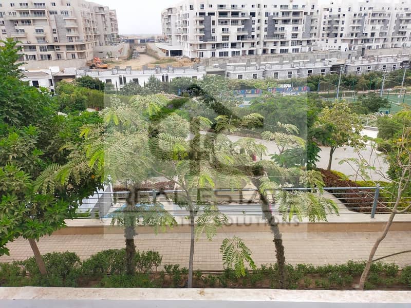 Apartment with a rare design on the lagoon and clubhouse in a very special location with the lowest total down payment price and installments in Mount 2