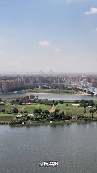 Double View Nile and Pyramids fully furnished hotel apartment next to Hilton Maadi