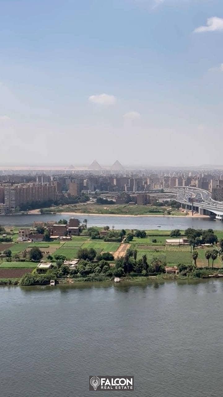 Furnished apartment imaginary view on Nile and pyramids with the highest investment return in Reve de Nil Tower Maadi next to Hilton and Nile Pearl 3