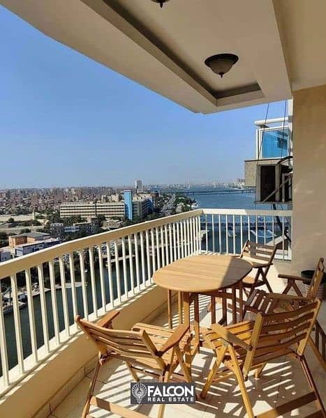 Furnished apartment imaginary view on Nile and pyramids with the highest investment return in Reve de Nil Tower Maadi next to Hilton and Nile Pearl 4