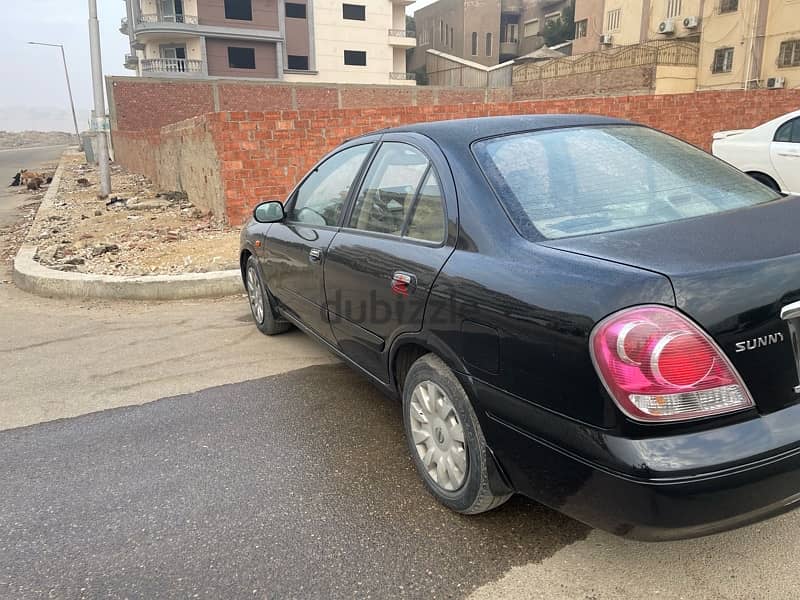 Nissan Sunny 2009 4