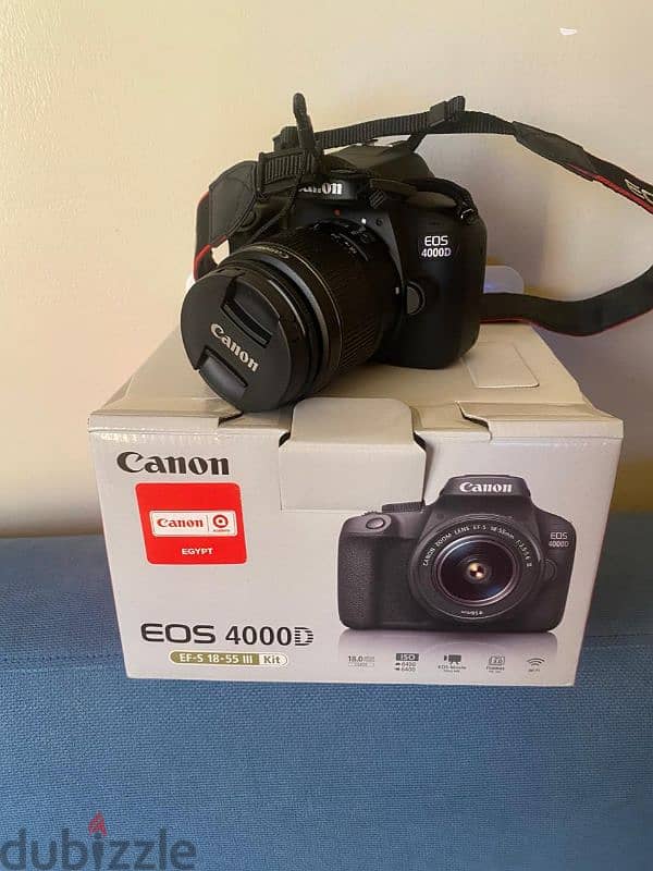 used like new  canon EOS 4000D EF 18-55 DC 1