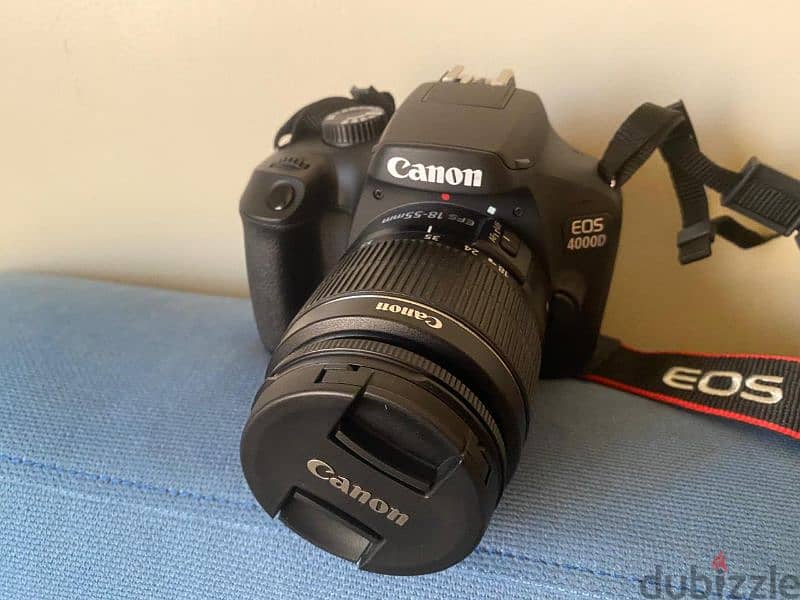 used like new  canon EOS 4000D EF 18-55 DC 4