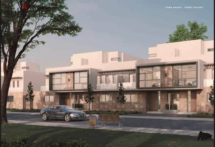 Live in KARMA GATES, a resale villa with a landscape view, in installments, prime location, direct on Dahshur Street