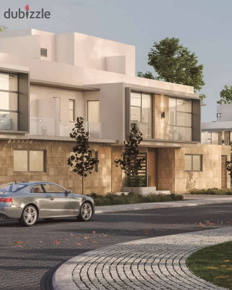 Live in KARMA GATES, a resale villa with a landscape view, in installments, prime location, direct on Dahshur Street 5