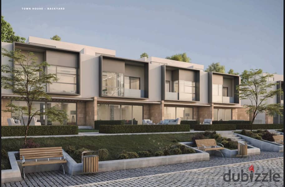 Live in KARMA GATES, a resale villa with a landscape view, in installments, prime location, direct on Dahshur Street 12