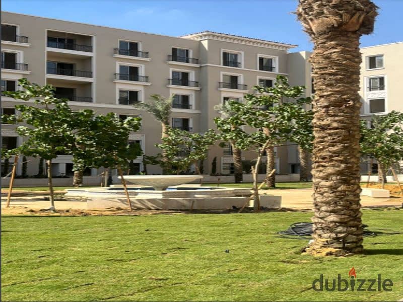 Corner townhouse for sale with extended installment plans, featuring 5 bedrooms, in Village West compound, one of the prime locations in Sheikh Zayed, 12