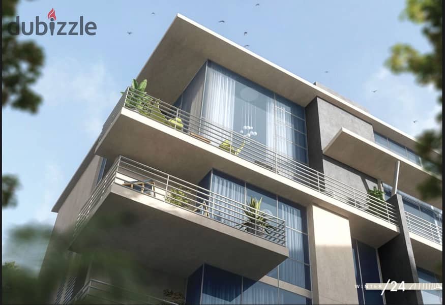 Live in a villa with a landscape view in installments in Village West in the heart of old Sheikh Zayed 11