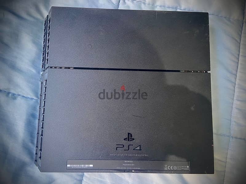 PS4 FAT 500 GB + 3controlles + 5 CDs 11