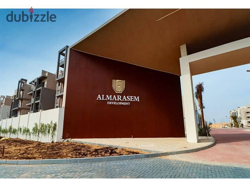 Apartment for sale in Marville Al Marasem Compound, New Zayed - distinctive view inside the compound 7