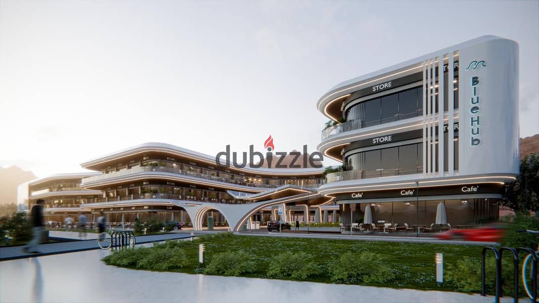 A commercial store with a service roof space directly on the sea in the first mall that holds a gas station license on Ain Sokhna Road with a 10% down 9